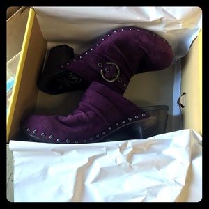 Dansko purple suede clogs.